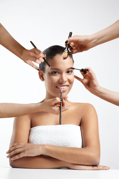 oman with a hands, making a makeup